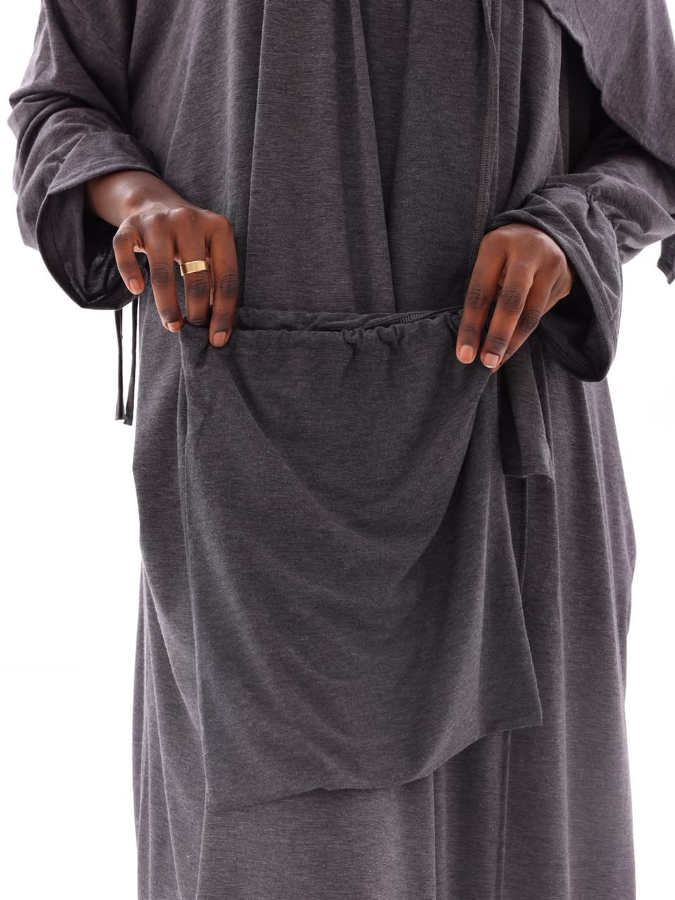 Drawstring pocket detail on the charcoal prayer set