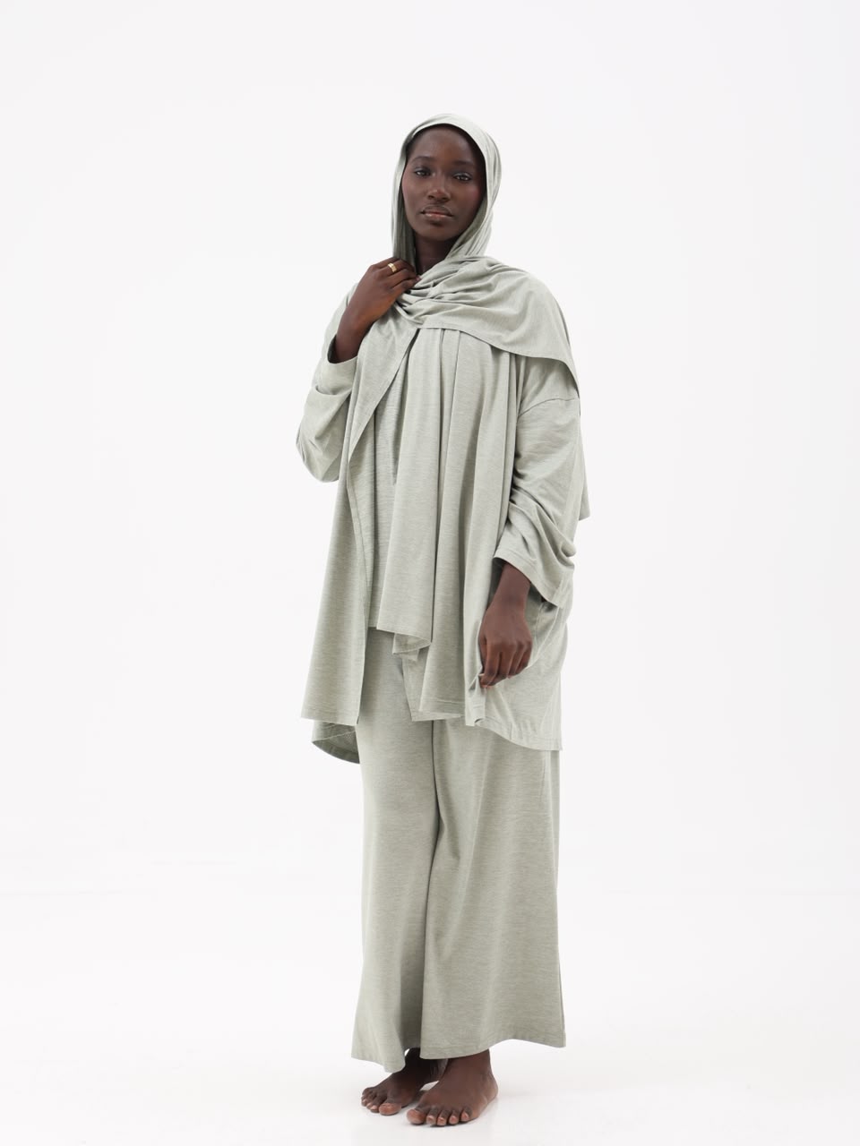 Sage set styled with the matching shawl draped as a hijab