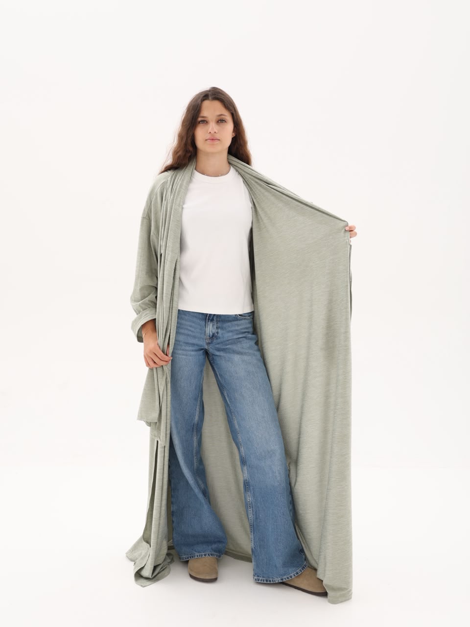 Open drape detail of the sage travel abaya