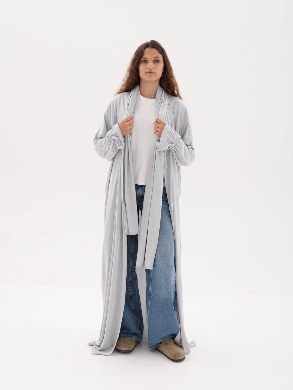 Cloud grey travel robe worn over jeans